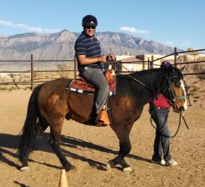 A man rides a Loving Thunder therapy horse